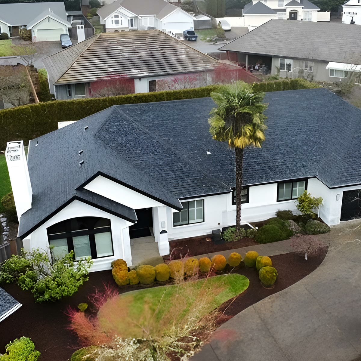 High-angle view of complex dark metal roof.
